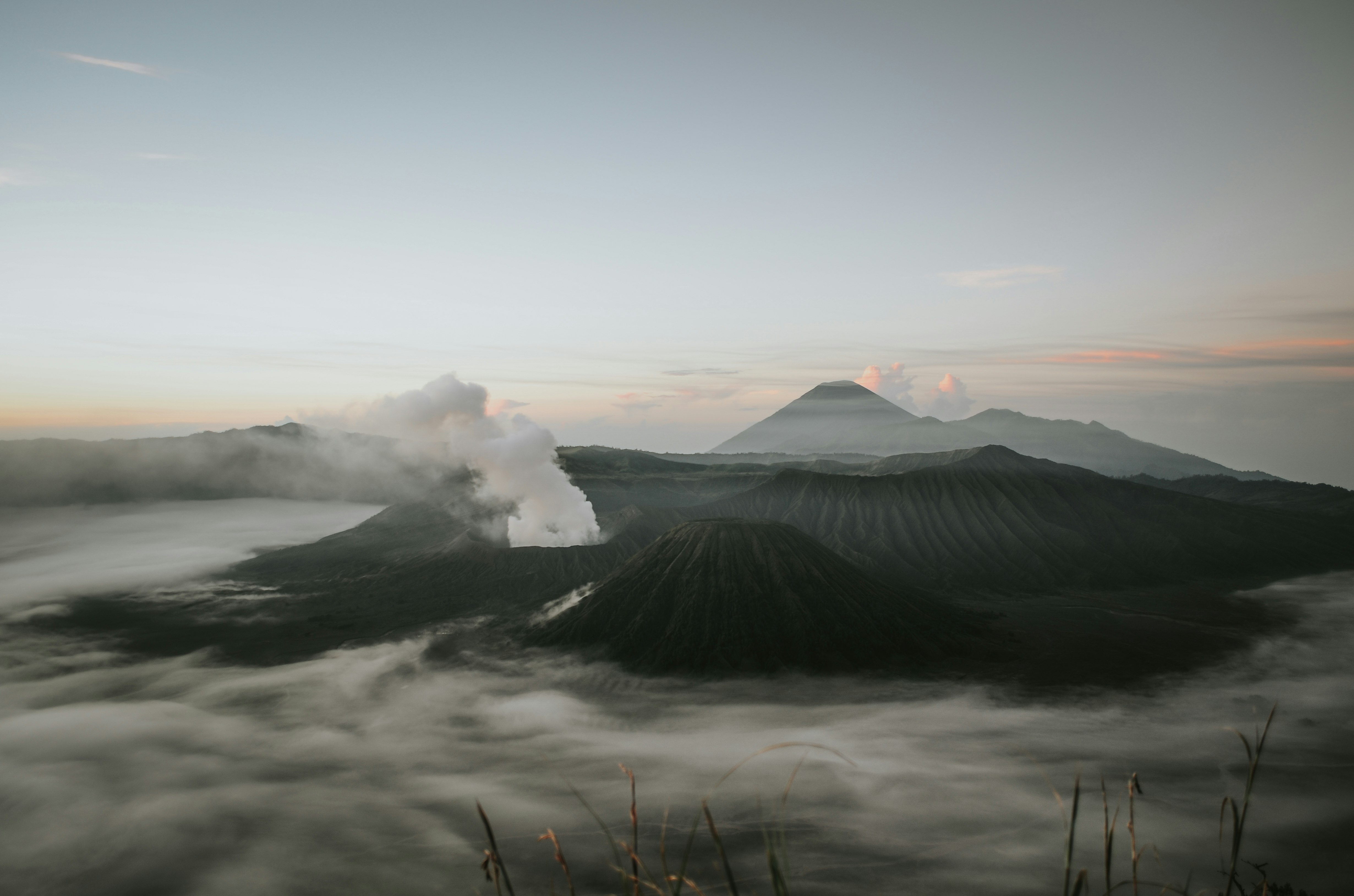 black mountain under white clouds during daytime